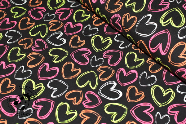 Sweat - French Terry - "Neon Hearts".   Cooles, farbenfrohes Dessin mit neonfarbigen Herzen auf schwarzem Hintergrund.  Angenehm im Griff, quer-elastisch. Mit aufgerauter Rückseite, deshalb kuschelweich und warm. French Terry eignet sich besonders gut für die Herstellung von kuscheligen Kleidungsstücken, wie z.B. Jacken, Pullover, Hoodies, Kleidern, T-Shirts, Mützen etc.  Winter-Sweat - Wintersweat - Nähen - Stoffe - Modestoffe - Damen/Frauen - Meterware - Glückpunkt.